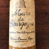 Bouteille vintage en grès marron jaune moutarde Marc de Bourgogne 1967 par Hello Broc brocante en ligne