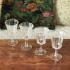 Lot de 4 petits verres à vin cuit sur pied évasés et striés contenance de 8 cl par Hello Broc brocante en ligne