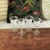 Lot de 4 petits verres à vin cuit sur pied évasés et striés contenance de 8 cl par Hello Broc brocante en ligne