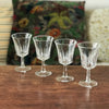 Lot de 4 petits verres à vin cuit sur pied évasés et striés contenance de 8 cl par Hello Broc brocante en ligne