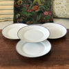 Lot de 4 assiettes plates en porcelaine blanche de Limoges liserés doré et bleu UML France par Hello Broc brocante en ligne