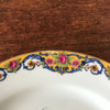 Lot de 4 assiettes à dessert en porcelaine de Limoges bordure jaune et fleurs multicolores par Hello Broc brocante en ligne