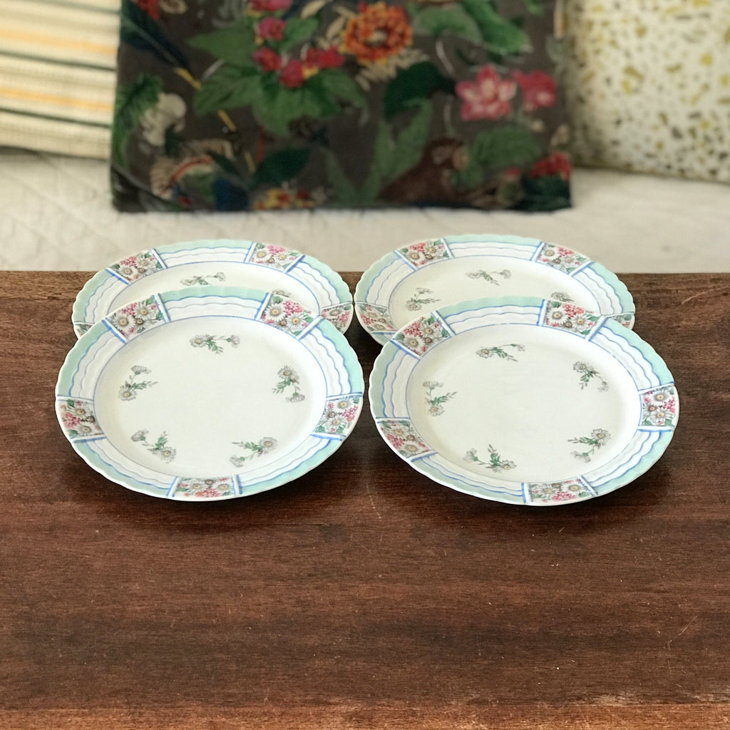 Lot 4 de petites assiettes en porcelaine de Limoges Lanternier décor bleu et fleuri