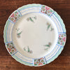 Lot 4 de petites assiettes en porcelaine de Limoges Lanternier décor bleu et fleuri