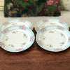 Lot 4 de petites assiettes en porcelaine de Limoges Lanternier décor bleu et fleuri