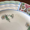 Lot 4 de petites assiettes en porcelaine de Limoges Lanternier décor bleu et fleuri