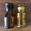 Lot de 2 bocaux style pot apothicaire en verre moulé ambré : 1 marron et 1 jaune par Hello Broc brocante en ligne