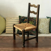 Chaise vintage pour enfant en paille et bois par Hello Broc brocante en ligne