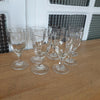 Lot de 7 verres anciens à liqueur sur pied en verre soufflé début XXème siècle - Hello Broc brocante en ligne