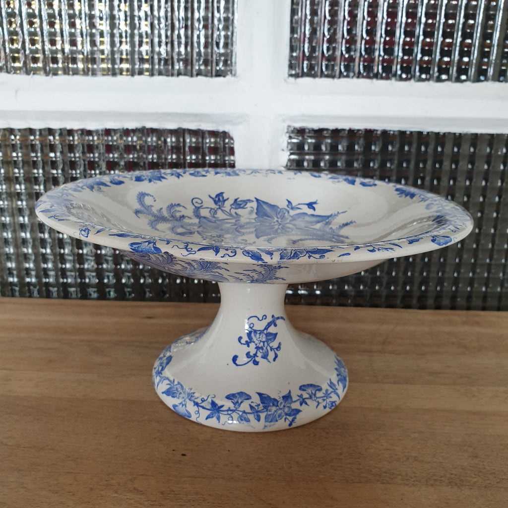 Compotier coupe à fruits sur piedouche Terre de Fer par Pexonne décor Liseron bleu éclat en-dessous par Hello Broc brocante en ligne