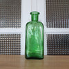 Bouteille verte de forme carrée en verre moulé par Hello Broc brocante en ligne