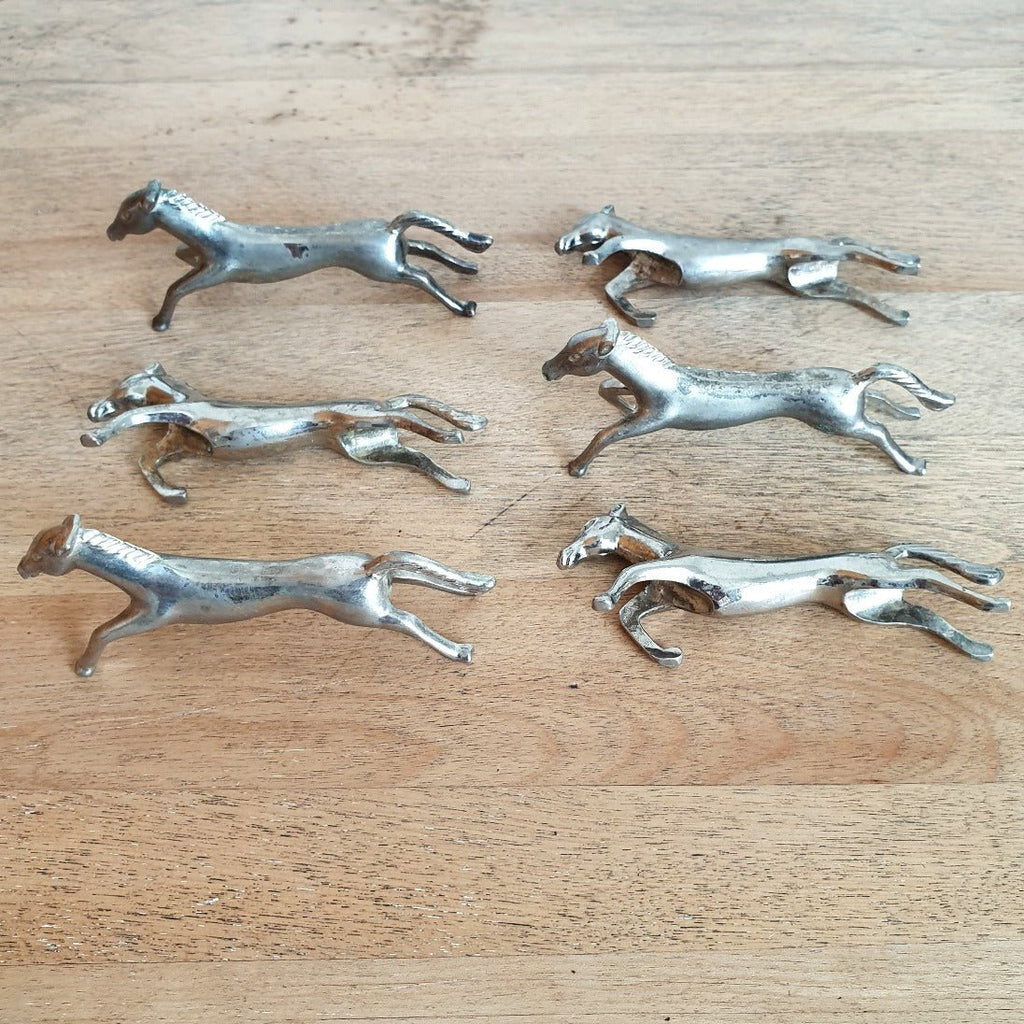 Lot de 6 porte-couteau forme cheval en métal chromé par Hello Broc brocante en ligne