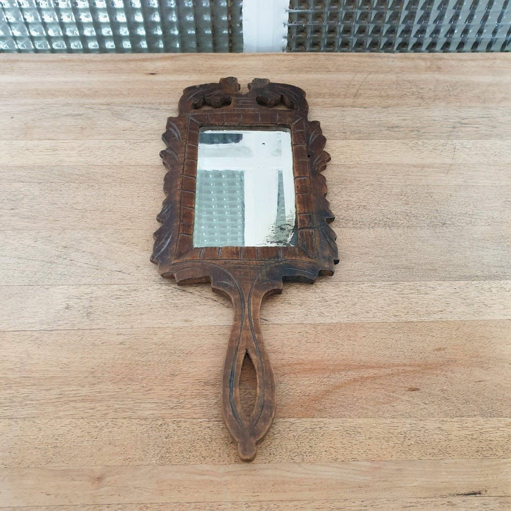 Miroir dit face à main en bois sculpté et verre biseauté - Hello Broc